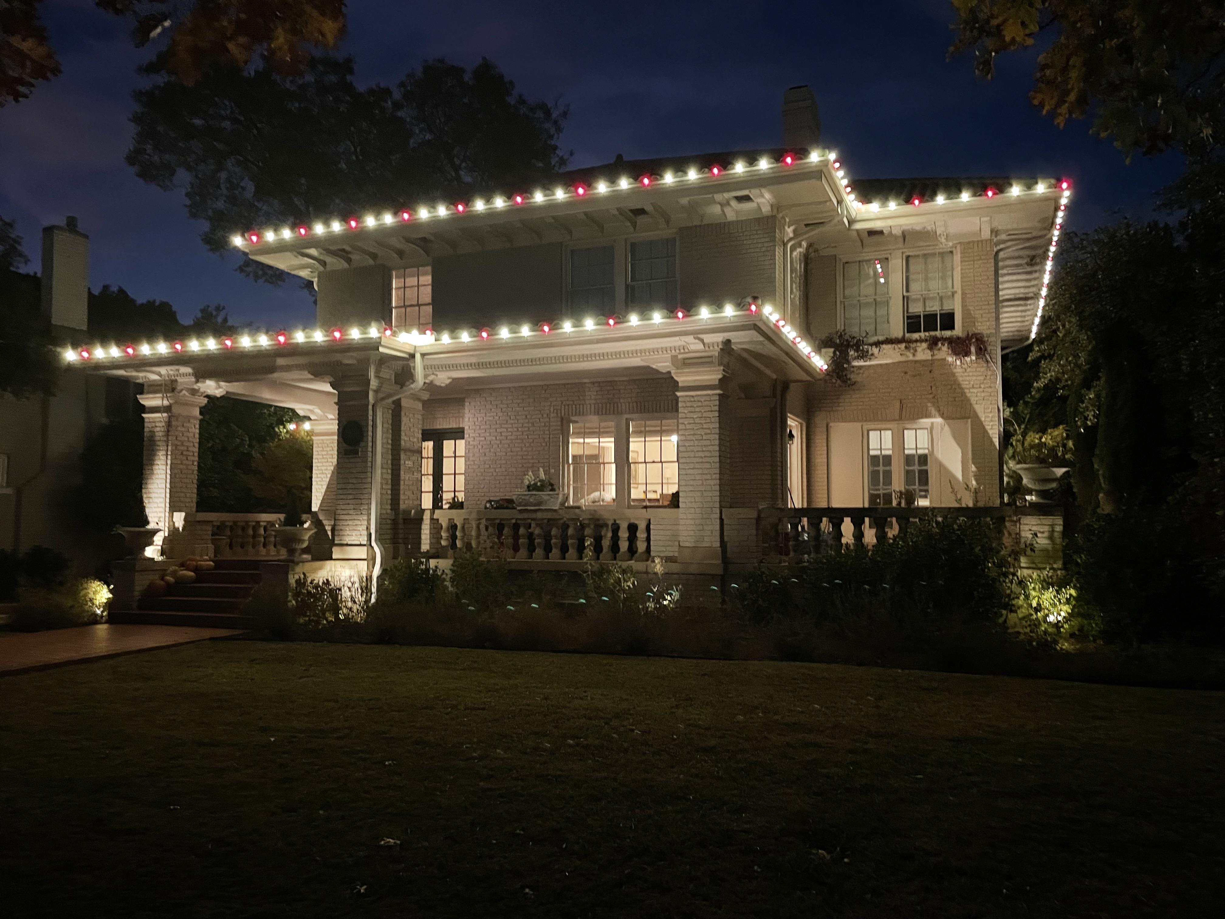 Professional holiday lights on two-story home